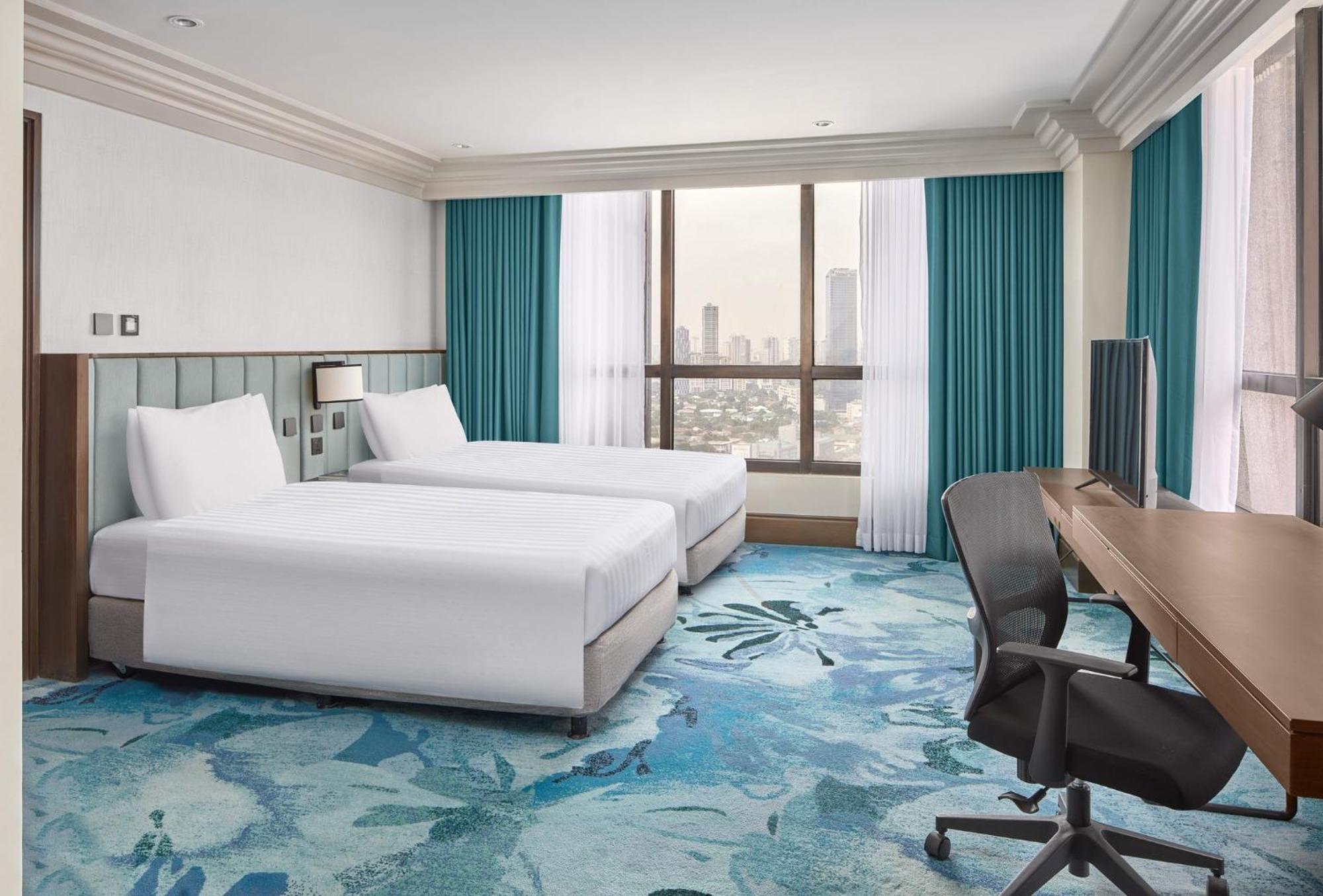 Holiday Inn & Suites Manila Galleria By Ihg Pasig City Экстерьер фото